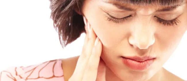 Cover for Tooth Sensitivity: Causes and Treatment