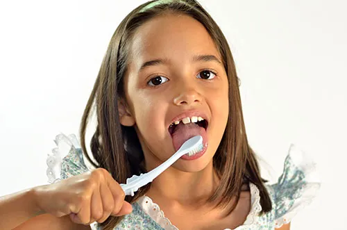 Cover for Should Brushing Your Tongue Be Part of Your Dental Hygiene?