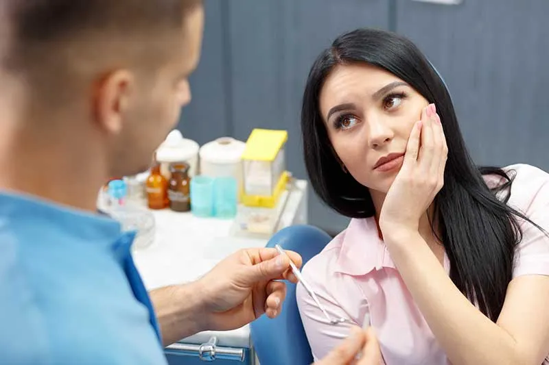 Cover for Tooth Extraction or Root Canal?